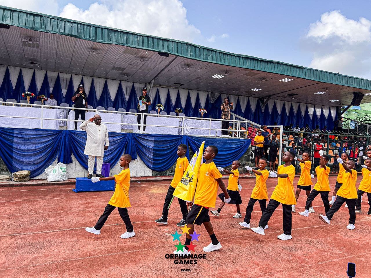 Children marching in the Orphanage Games opening parade