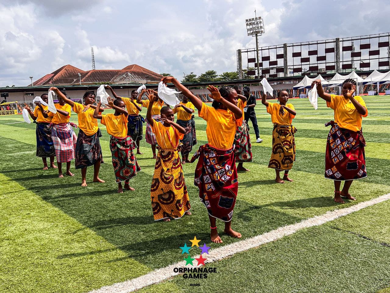 Children performing traditional cultural dance at the Orphanage Games